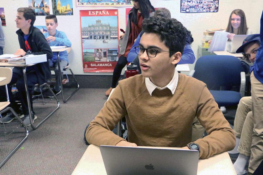 Sophomore Ayman Bolad prepares for a presentation in his Spanish class. Bolad said this trip gave him more exposure on Spanish culture and language.  