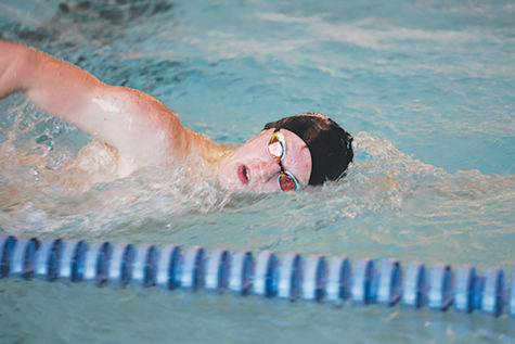 Sophomore Wyatt Davis swims freestyle during practice. Last year, Davis swam the 100m backstroke, 500 yard freestyle and two relays. 