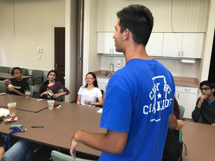 Nicholas Gemelas, Carmel Mayor’s Youth Council (CMYC) member and senior, presents at a council meeting. The CMYC planned a variety of events, including an intramural basketball tournament.