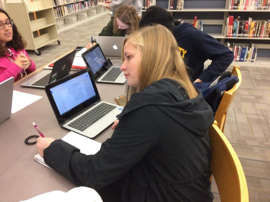 Lauren Roop, House member and senior, studies in the library to make time for the final House events of the year. She said she is excited for the upcoming events.