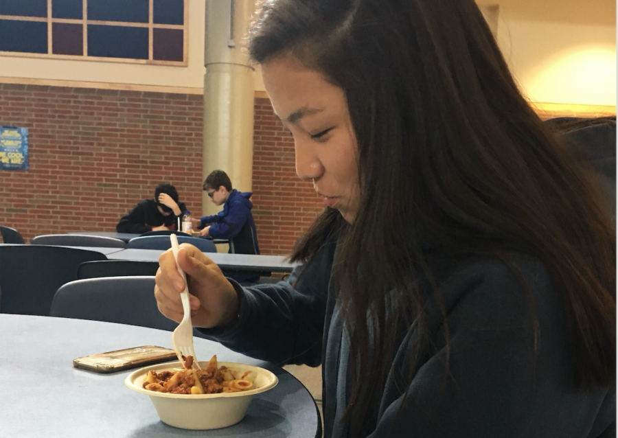 Ellie Backer, CDC soccer player and freshman, eats lunch in the CHS freshman cafeteria. She discussed why she likes CDC. “CDC sports make playing and exercising more fun and it’s mostly a friendly competition,” Backer said.