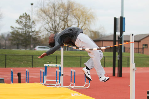 Ryan Macharia, high jumper and sophomore, rehearses his event during practice. The team will have its next home meet on Tuesday.