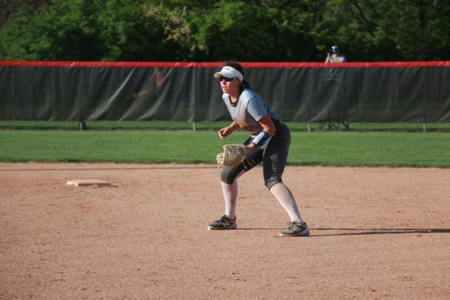 Sophomore Brooke Bair gets in a ready position at second base. Bair broke her leg at the game against North Central on May 8 by colliding with right fielder Ella Greenawald, both trying to catch a fly ball.