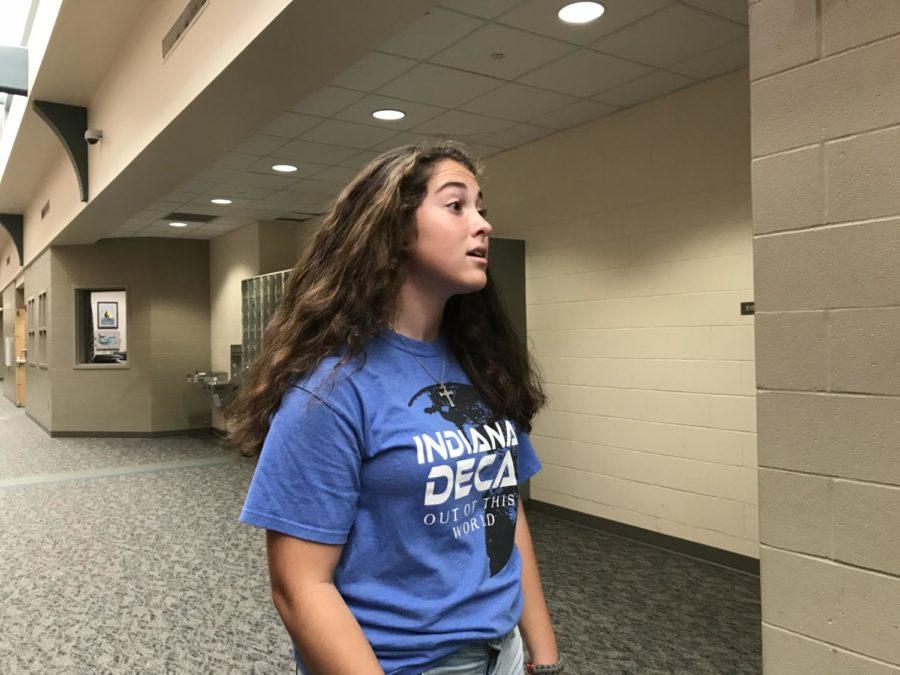 Audra Marchese, Champions Together co-president and sophomore, walks through the performing arts hall during SRT. She said the club is a with, not for, meaning the club members, with and without intellectual disabilities, work alongside each other rather than one group working for the other.