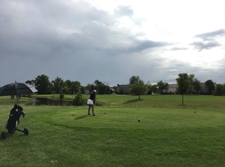 Nina Hecht tees off on the seventh hole at Plum Creek golf course. Hecht said she hopes the team can win a state championship this year