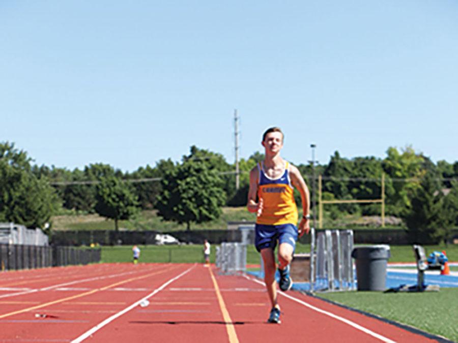 Straight running:
Trevor Johnson, cross-country runner and junior, runs on the track. Johnson’s ectomorphic body shape helped him to complete his training. According to infofit.ca, the perfect runner has a light frame and a medium to small height. 