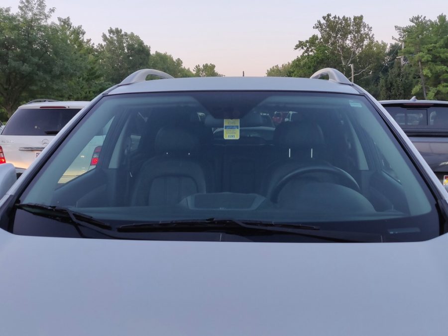 A parking permit hangs in a students car. Students are required to display these on their vehicles before September 4. 
