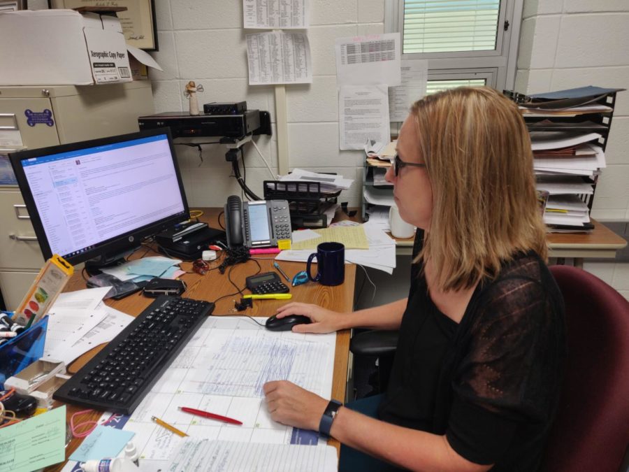  Michelle Foutz, Senate sponsor and social studies teacher, checks her email during SRT. According to Foutz, in addition to upcoming appreciations, Senate is starting to plan for Care to Share and even setting dates for future meetings.