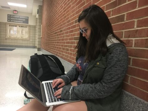 Katelyn Wang, speech team member and sophomore, works on cutting her speech for the speech team’s upcoming competition on Oct. 27. Wang said she is is especially excited for this competition because she found out the speech team and debate team will travel together. 