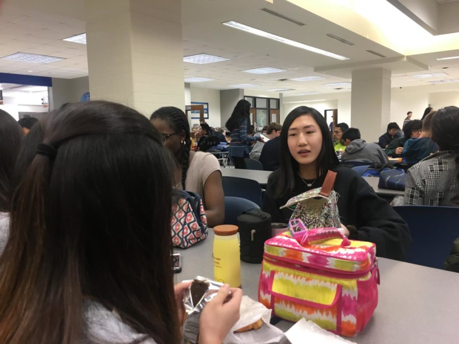 Sophomore Carol You talks to her friends during lunch. You said she is excited to give a TED talk at the conference on Dec. 1 about Asian misrepresentation in the media.