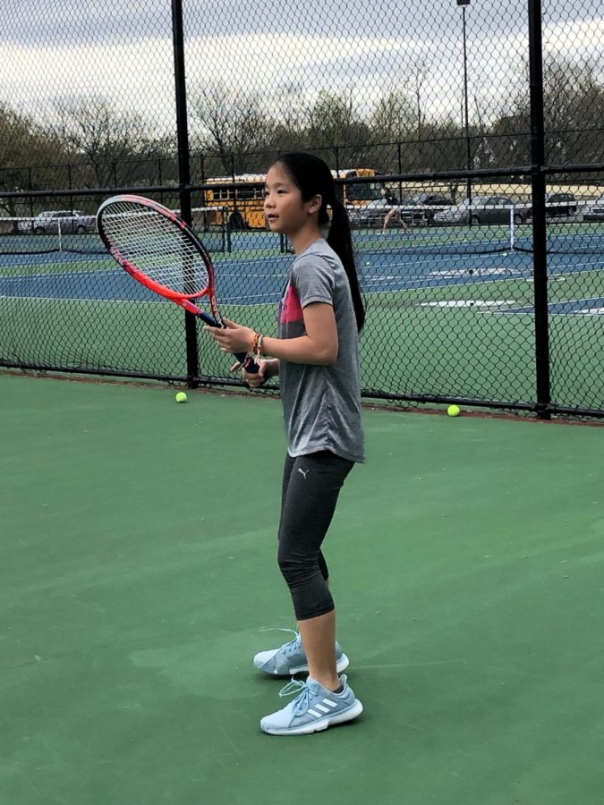 Freshman Form:
Freshman tennis team member Nicole Lu begins to set up for a forehand during practice on Apr 25. The freshman have played 3 matches this season and will play Brebeuf Jesuit High School on the 26th. 