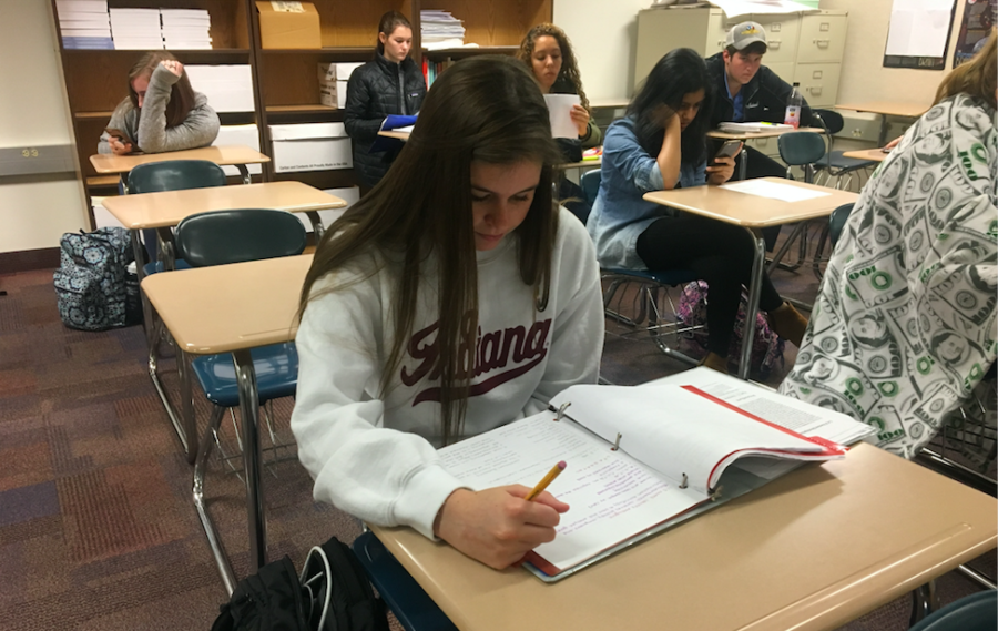 Mentor and senior Caroline Crediford studies during SRT before going out to meet her mentees during third period. According to K-8 Mentoring teacher Robin Pletcher, the mentors met their kids for the first time last week.