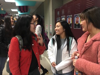 Selin Oh, TEDx president and senior, talks to her friends in the performing arts hallway on Oct. 31. Oh said she is excited about the speakers’ event on Nov. 4 as she hopes it will give the speakers an opportunity to talk to one another in a relaxed environment. 
