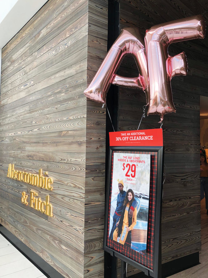 Balloons float in the entrance to the new Abercrombie & Fitch (A&F) store at the Fashion Mall. Sophomore Zoe Edwards said stores such as A&F can successfully rebound if they address their mistakes. 
