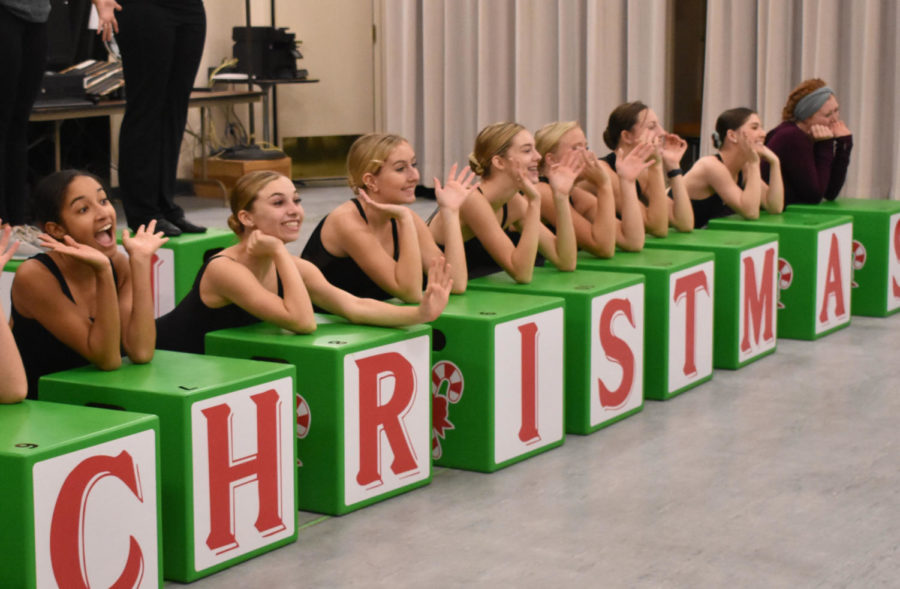 Dancers from Expressenz Dance Center work on their doll number during rehearsal. Dancer and senior Macie Harris (far right)said the letter blocks form words during the dance.