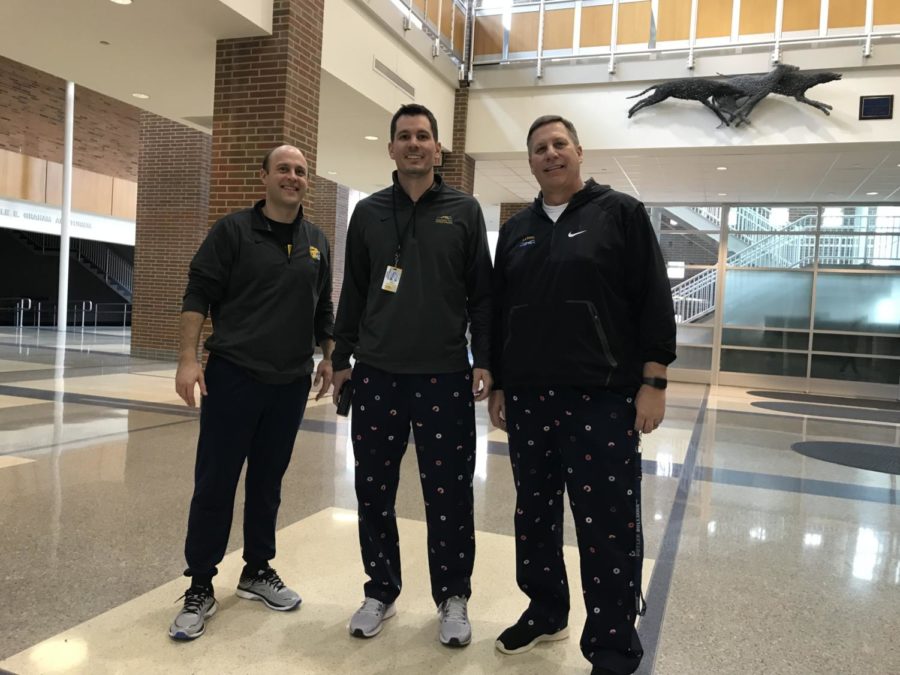 Principal Tom Harmas, assistant principal Toby Steele and social studies teacher Justin Quick sport matching pajama pants on the first day of Culture of Care week. The first spirit day this week was pajama day. 
