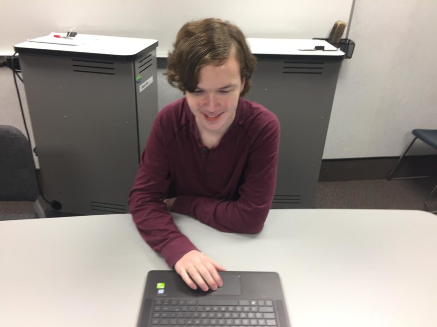 Joey Herons, Math club president and senior, works at his desk in independent study math. He said that he is excited for the new courses. 