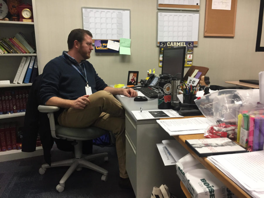  Chad Andrews, Teens with a Choice sponsor, works at his desk during the morning. Andrews said the club will host a meeting in his room Feb. 13.