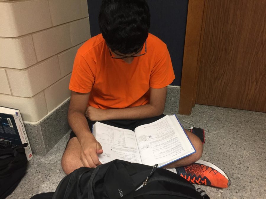 Abinay Devarakonda, Key Club secretary and junior, studies during outside of his math class. Devarakonda said he is happy that Key Club offers students the ability to give back to the community through volunteer work.