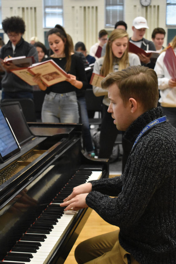 KEYS TO SUCCESS (RIGHT):
Kyle Barker, associate director of choirs, plays the piano during a rehearsal. Barker said he hopes that this musical will target a different audience.