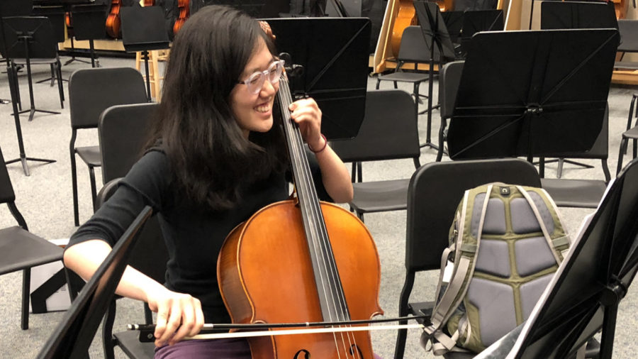 Selin Oh, Camerata cellist and senior, practices her cello in the orchestra room after school. Oh said she especially looks forward to playing Vivaldi’s “Four Seasons,” which was composed to go along with four sonnets.