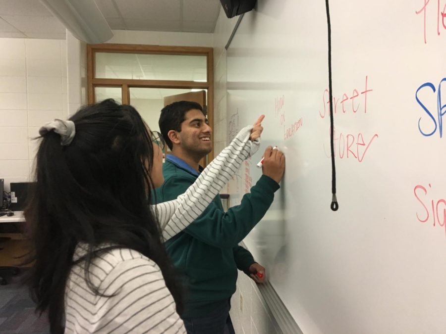 Juniors Karthik Arcot and Shivani Balachander brainstorm projects for next school year. Design for CHS has continued individual projects like Hands on Education since the Street Store event on March 16.