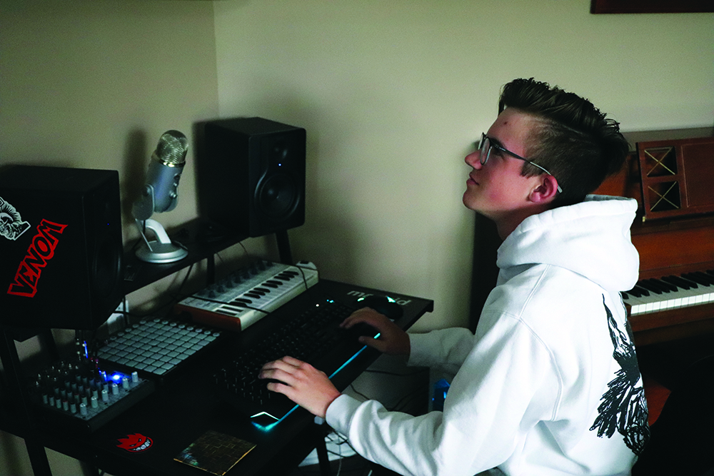 Junior and prospective Last Rock of Summer performer, Ethan Meneghini, works on his music over the summer in preparation for the LROS. Meneghini has created his own home studio that he works out of to produce his own music.