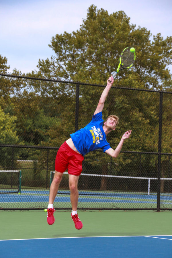 Carter Novak, junior varsity mens tennis player and senior, plays a practice doubles match against fellow CHS team member on Aug. 30. The varsity mens tennis team will compete in the MIC Championship at Ben Davis tomorrow, Sept. 21 at 8:30 a.m. 
