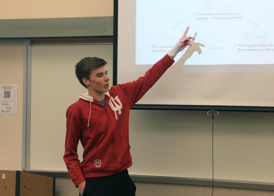 MONEY TALK: Junior Erik Nelson discusses drop shipping, a business retail strategy, during an Entrepreneurship Club meeting on Feb. 18. During the meeting, Nelson shared his experience running an online merchandise business through an Instagram account. The next Entrepreneurship Club meeting is on March 17.