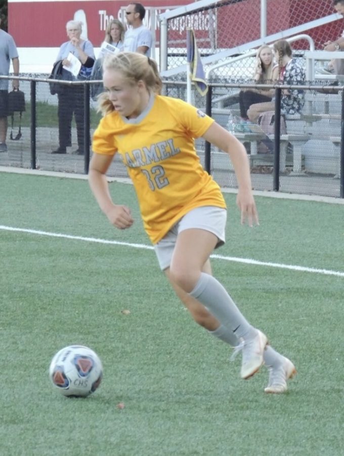 Looking for the next pass, forward and sophomore Lauren Rainbolt dribbles up the field. “We’re ready for the State [tournament] with this group of girls. Weve only gotten better this whole year,” said Rainbolt.