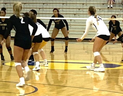 The women's varsity volleyball team plays at the Carmel Invitational against Brownsburg and Bloomington High School South. CHS defeated Brownsburg, but lost against Bloomington High School South.