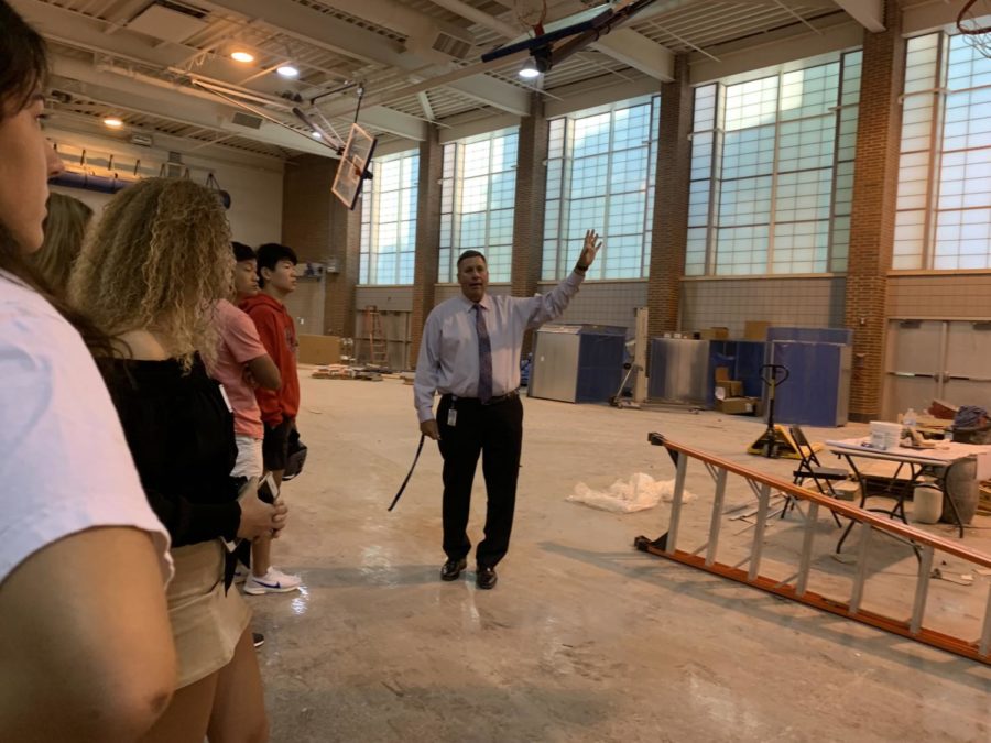 Principal Tom Harmas shows the Superintendents/Principals Advisory Council updates on the construction on the fieldhouse. Harmas said construction by Door 21 should wrap up by Nov. 1.