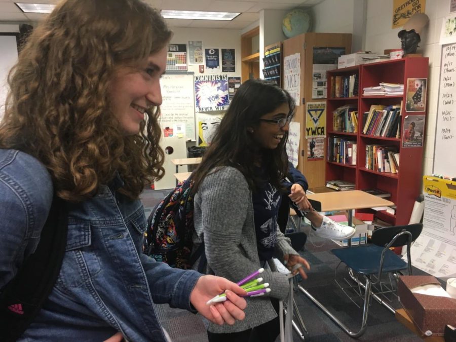 Sarah Konrad, design head and junior, takes part in a conversation after school with her friends. Konrad said that right now, the TEDx club is focused on increasing its membership.