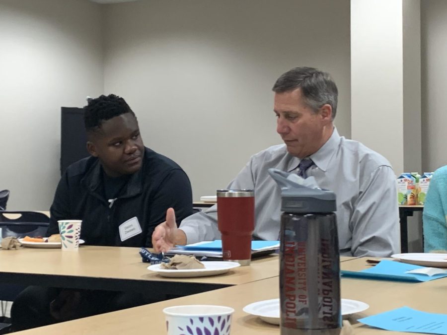 Principal Tom Harmas discusses winter construction with speaker of the House Deion Ziwawo during a Superintendents/Principals Advisory Council meeting. Harmas said QR codes will be put up in ever SRT classroom next year so students can pull up directions to relocated offices.