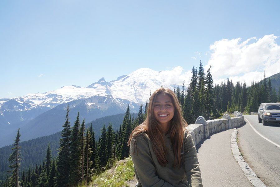 GREAT VIEWS: 
Junior Michelle Boulos smiles next to a mountain range. Boulos said she loves traveling because she gets to experience it with family.
Submitted Photo by Michelle Boulos