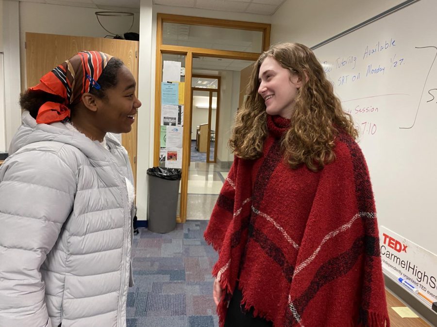 Sarah Konrad, TEDx president and junior, (right) talks to Carmen Broadnax, TEDx club member and junior, (left) before the TEDx meeting on Jan. 27. Konrad said the club’s main focus right now is planning for the speaker auditions, which are scheduled for Jan. 30 in Room E235.