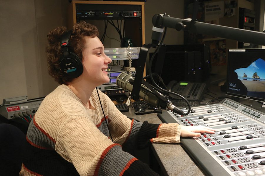 Jesse Cooper, WHJE staff member and junior, practices broadcasting for the Riley-a-Thon on WHJE radio. Cooper said she hopes the Riley-a-Thon will continue as an annual event even after her graduation.
