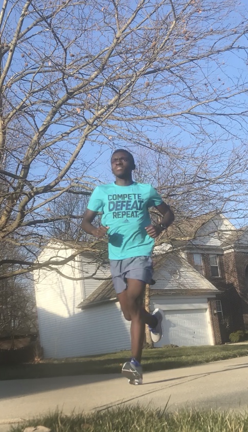 Daniel Musapatika, track runner and junior, runs in his neighborhood over break. Musapatika said it was important to consistently run to have good results later in the track season.