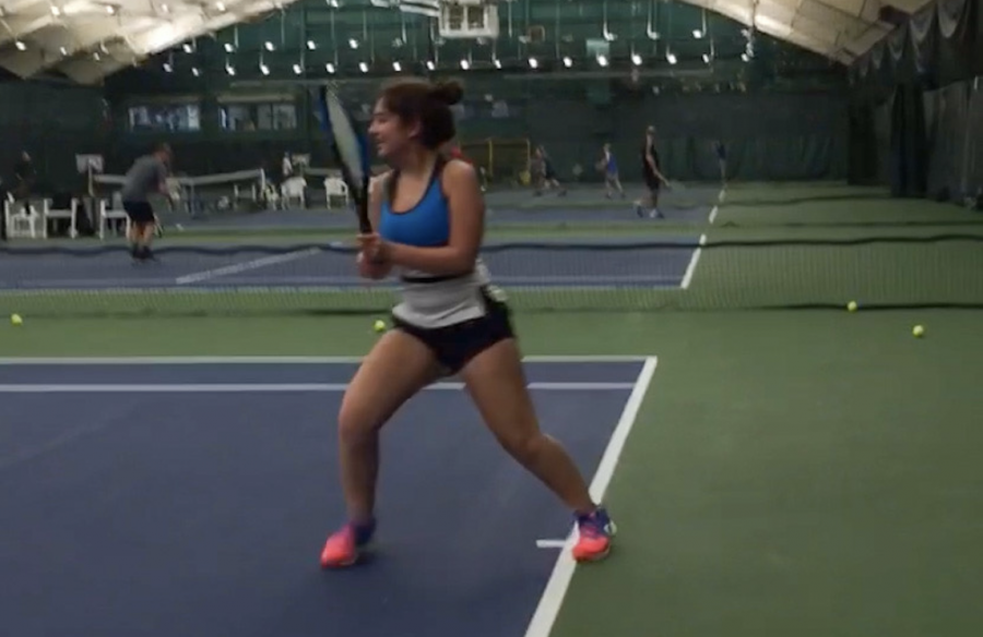 Jennifer Karakash, womens tennis player and sophomore, practices at a club court. Karakash said it was hard to find someplace to practice with school practices postponed and clubs closing due to the coronavirus.