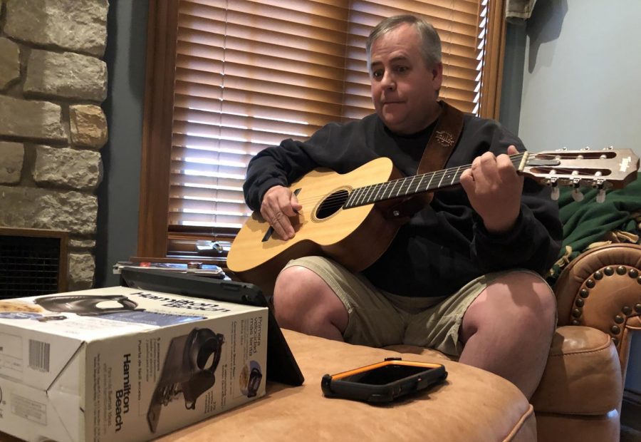 Matthew Misterka takes his guitar lesson from his instructor, Robert Wood, over facetime. Due to COVID-19, Misterka and Wood were no longer able to meet in person, but it would not stop them from connecting digitally. Misterka has been taking guitar lessons from Wood for almost 7 years.