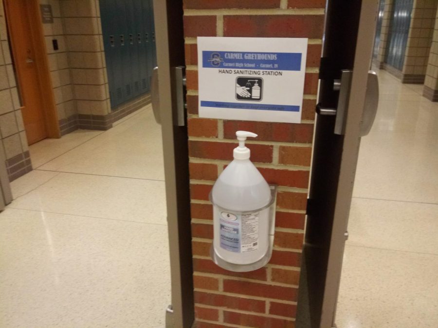 Various containers of hand sanitizer line the halls. Hand sanitizer, signs and other procedures items will line up the halls.