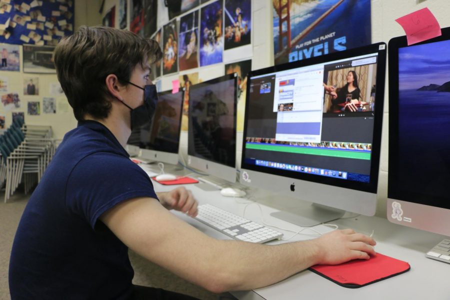 FINAL CUT: Senior Curt Masengale edits his collaborative film project in his IB Film class on March 3. I enjoyed editing the film because I got to see 30 hours of production condense into 12 minutes of screen time, Masengale said.