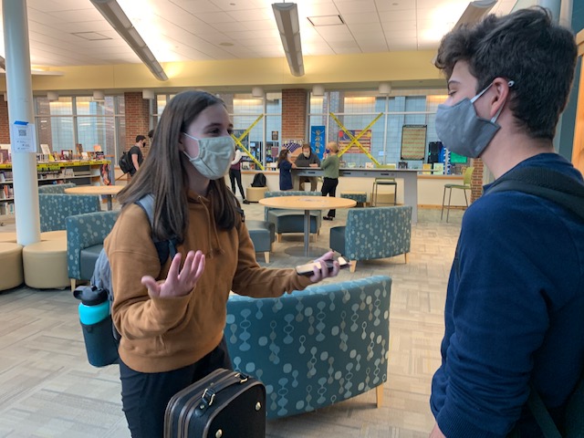 Clizia Martini, President of Active Minds and junior, talks after school to her friend, junior Ethan Stoehr after school. Both Martini and Stoehr were attending Debate Club.