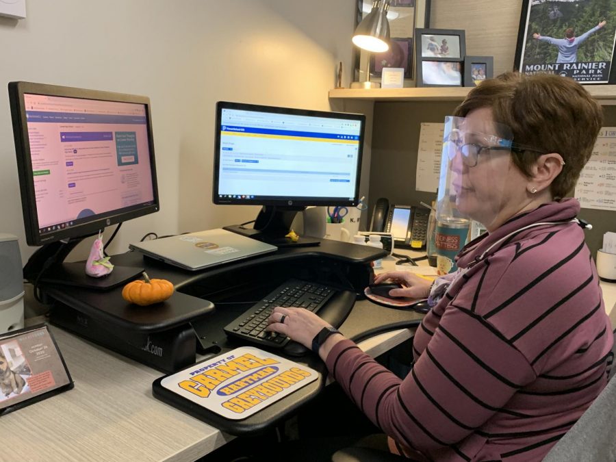 Counselor Kris Hartman works on finalizing college recommendation letters. According to Hartman, Nov. 1st is a big deadline for her and many senior students, so the week is hectic.