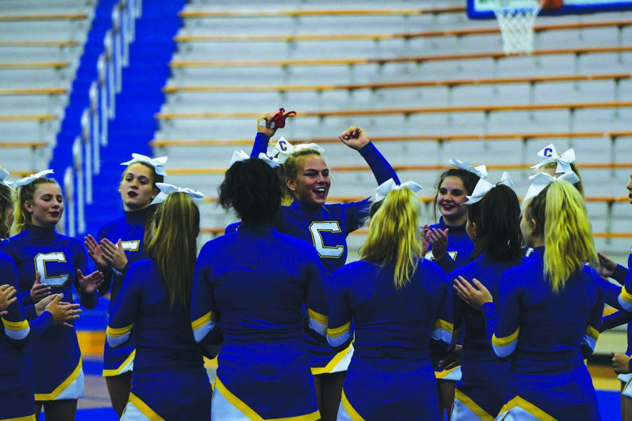 CHEER-ING UP:
Riley Shockey, varsity cheerleader and senior, pumps up her team for an upcoming routine. Shockey said when she performs in front of an audience there is more excitement and adrenaline.However, with new COVID-19 safety guidelines, her virtual performances have no audiences, which she said makes it harder to perform.