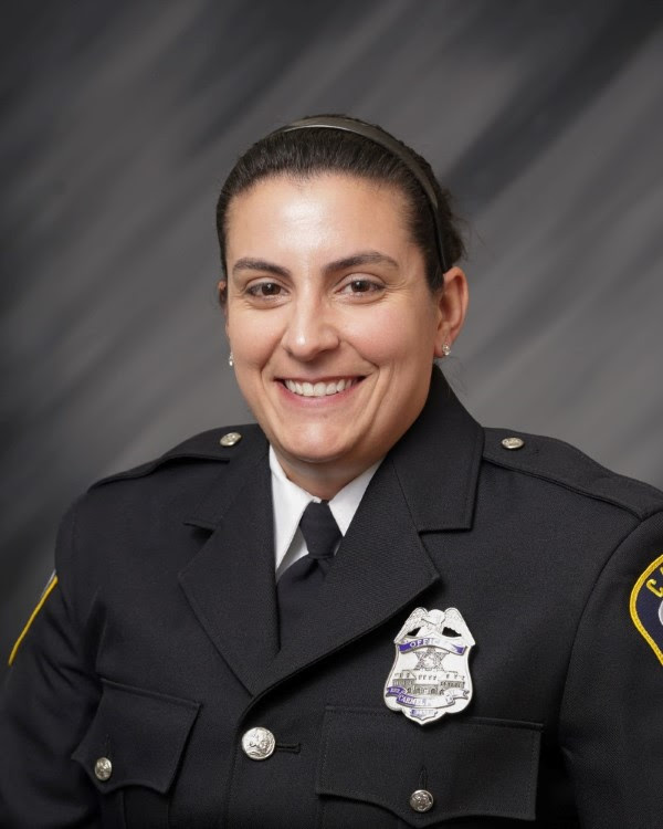 Officer Ashey Williams poses for a headshot photo. Williams said she had worked at the Carmel Police Department since 2008.