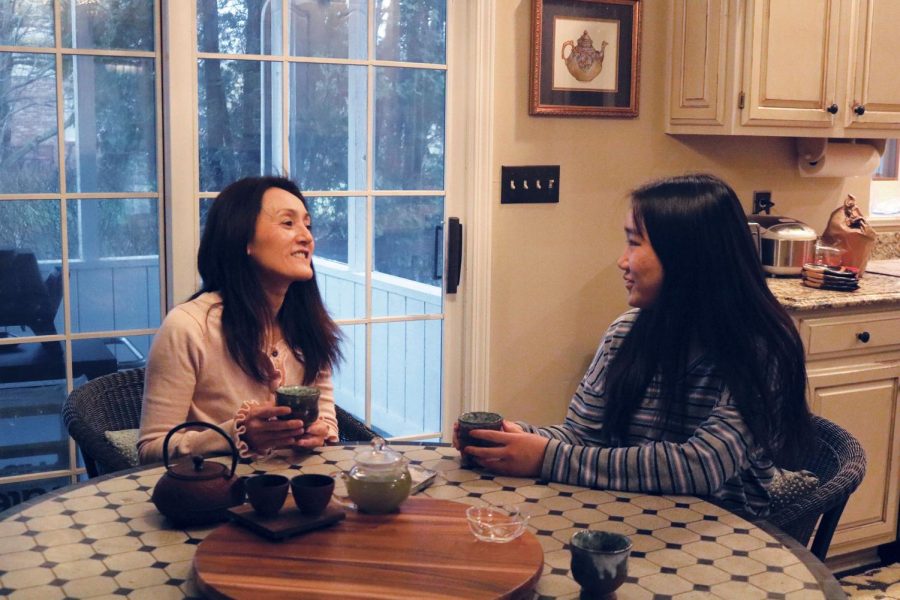 Junior Remi Shirayanagi and her mother, Ikue Shirayanagi sit at their kitchen table discussing the different types of tea that they enjoy the most and the history behind each tea after brewing their own cups of green tea. Remi said that tea is a large portion of her family’s life, as it is included in most of her family’s meals, and, if a guest comes over, their family would present the guest with tea as a welcome gift. 