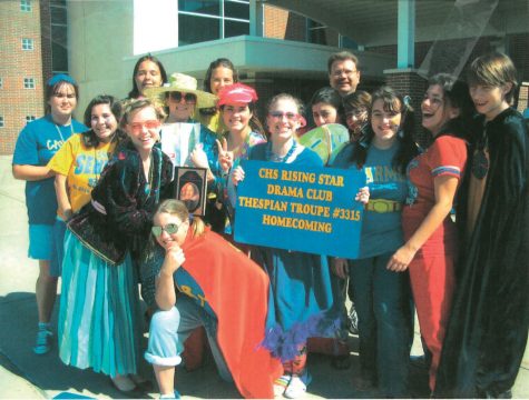 Jim Peterson (farthest back), co-director of theater and film who has worked at CHS since 1992, poses with the Rising Star club before the Homecoming parade in 2007. “(The Homecoming parade) was a really special time,” he said.