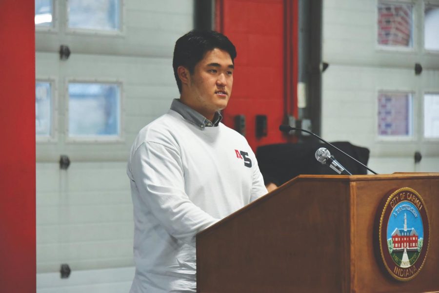 Elijah Choi, co-founder of Advancement of Asian Americans in Arts and Athletics (A5) and senior, speaks at a gathering by the City of Carmel on April 28.