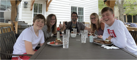 Freshman Braeden White (left) along with his brother, freshman Brooks White (right) and his mother, Amy White-Meadows  (middle-right) went to their grandparent’s house for a family dinner 
on May 2. 